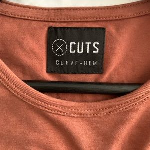 Cuts Clothing long sleeve curved hem in large. Red-ish colour